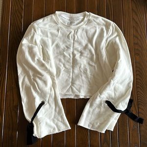 White crewneck with arm detail